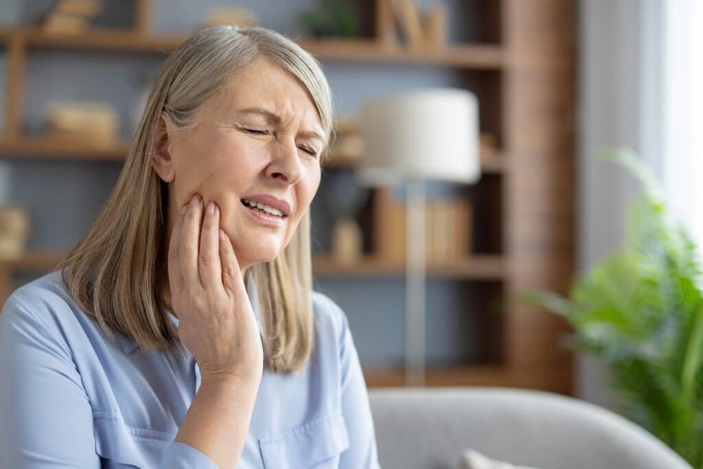 a older women surfing tooth pain